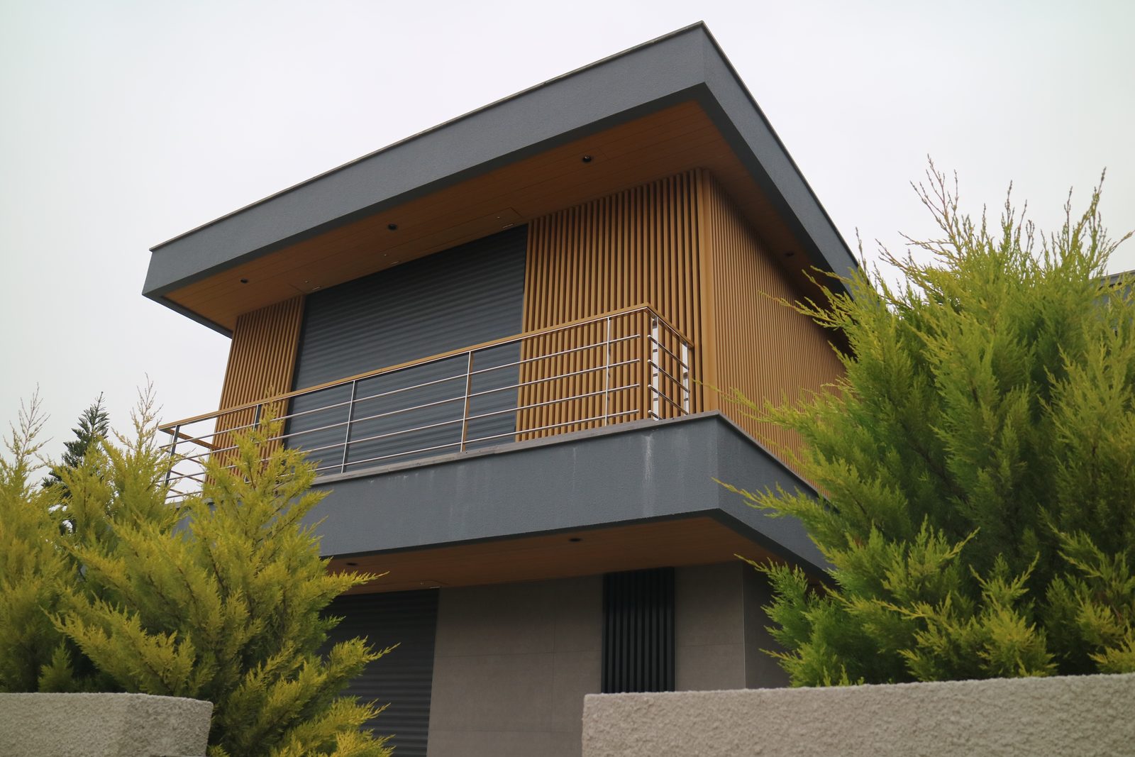 Corner detail of a balcony finished with composite wall cladding